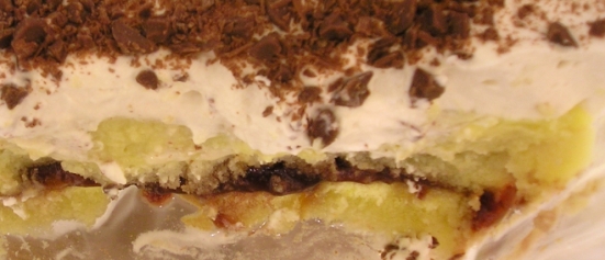 A close-up of the trifle layers. The pound cake and raspberry jam have sort of fused into one *amazing* fruity layer.